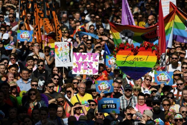A same-sex marriage rally in Sydney, where thousands marched ahead of a contentious postal
