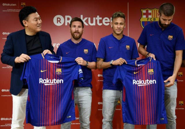 Barcelona star Lionel Messi (2nd L), former player Neymar (2nd R), Gerard Pique (R) and Ra