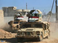 Humvees of the combined Iraqi forces and Popular Mobilization units advance through the town of Tal Afar, west of Mosul August 26, 2017 Humvees of the combined Iraqi forces and Popular Mobilization units advance through the town of Tal Afar, west of Mosul August 26, 2017