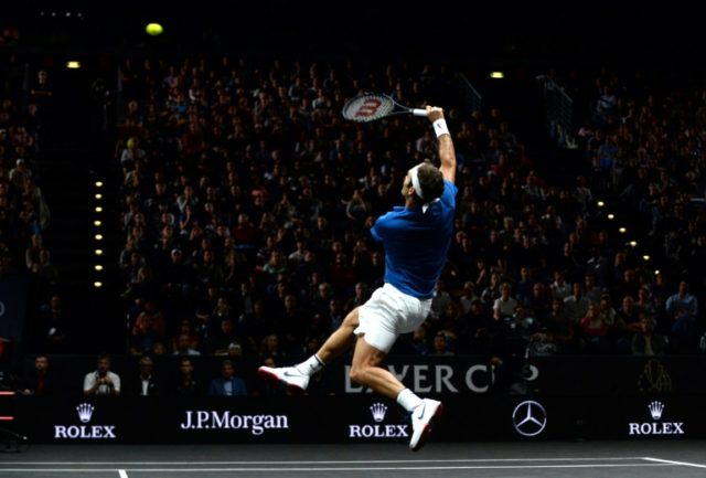 Swiss tennis player Roger Federer of Team Europe returns a ball to Sam Querrey (not in pic