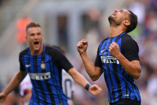 Inter Milan's defender Danilo D'Ambrosio celebrates after scoring against Genoa on Septemb