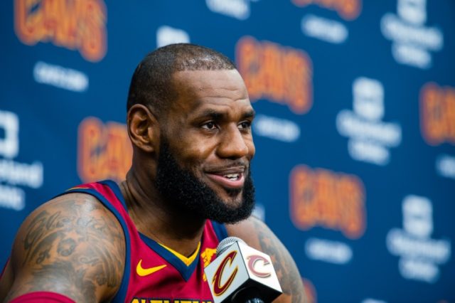 LeBron James of the Cleveland Cavaliers talks to the media during Media Day at Cleveland C
