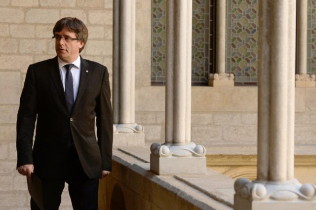 Catalan regional president Carles Puigdemont may face arrest for pressing ahead with the O