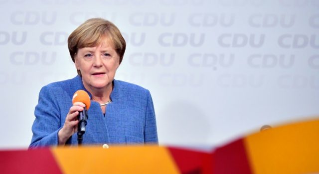 German Chancellor Angela Merkel clinched a fourth term in Germany's election on Sunday, bu