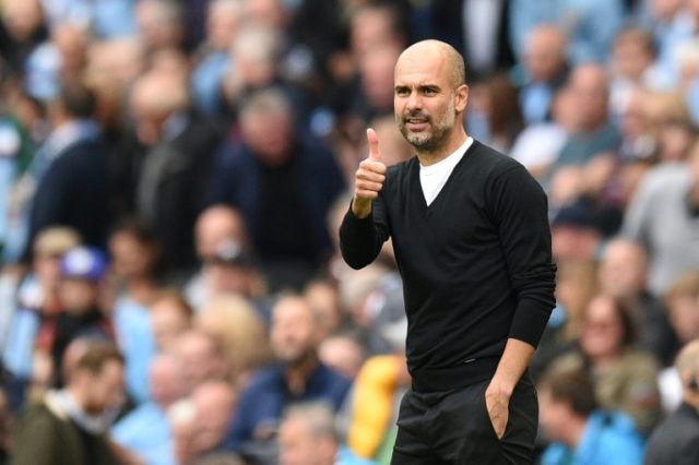 Manager Pep Guardiola's Manchester City are top of the Premier League after winning five a