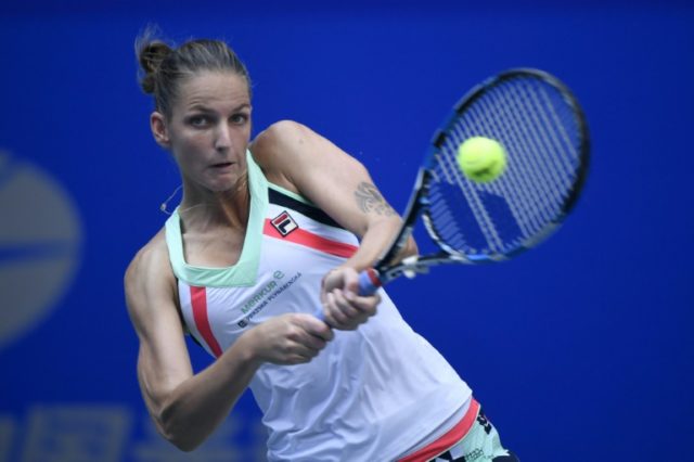 Czech's Karolina Pliskova hits a return against Shuai Zhang of China during their second r