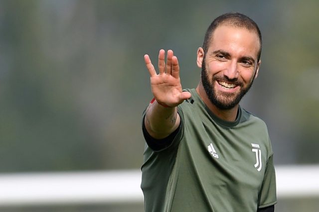Juventus' Gonzalo Higuain takes part in a training session in Vinovo, near Turin, on Septe
