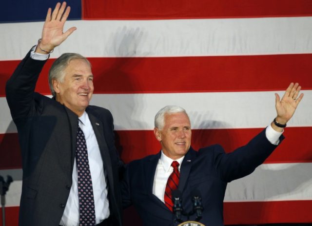 Vice President Mike Pence, right, joins Senator Luther Strange at a campaign rally in Birm