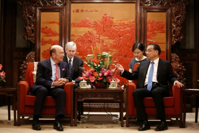 US Secretary of Commerce Wilbur Ross (L) met with Chinese Premier Li Keqiang (R) in Beijin