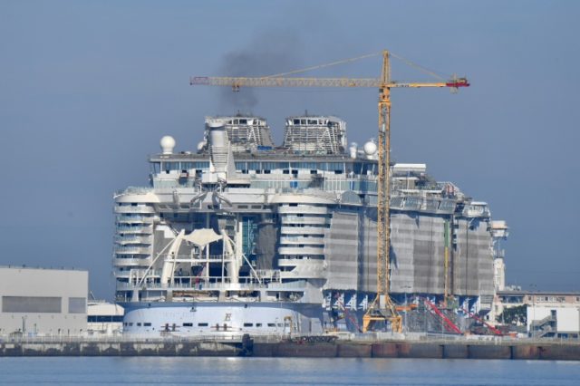 A cruiseliner under construction at the STX shipyards, France's biggest, as Paris and Rome