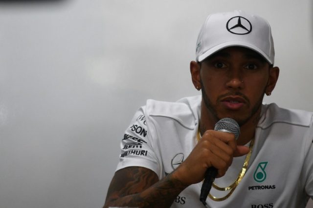 Mercedes's British driver Lewis Hamilton, who has backed US sports stars' protests, speaki