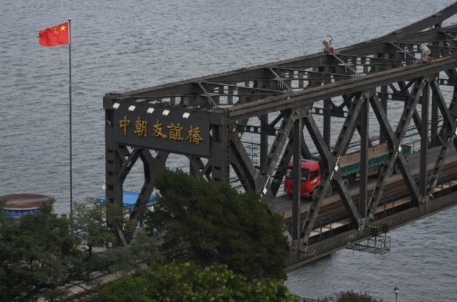 A truck returns from North Korea over the Friendship Bridge, at the Chinese border city of