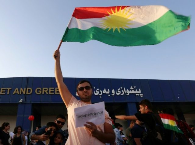 Iraqi Kurds take part in a demonstration at Arbil airport, in the capital of Iraq's autono