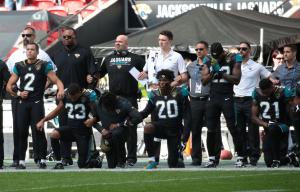 Shahid Kahn: Jacksonville Jaguars owner joins team during national anthem protest