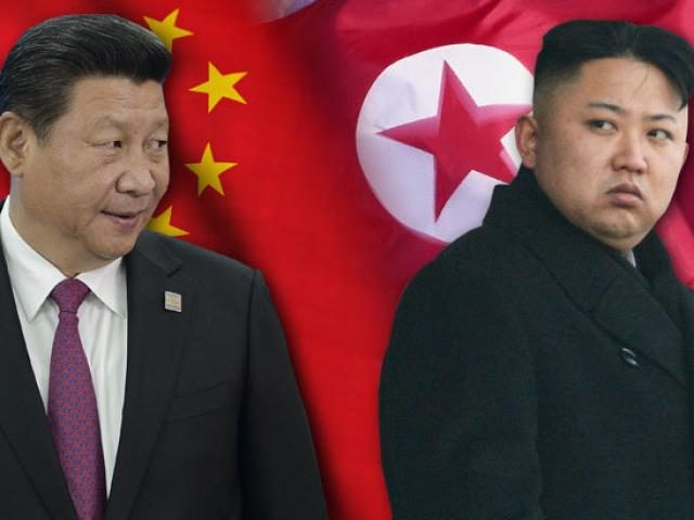 Chinese President Xi Jinping and North Korean dictator Kim Jong-un scowling