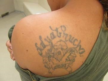 Salvadoran woman displays MS-13 tattoos after being arrested after illegally crossing border in South Texas. (Photo: U.S. Border Patrol)