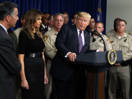 President Donald Trump speaks after meeting with first responders and private citizens that helped during the mass shooting, at the Las Vegas Metropolitan Police Department, Wednesday, Oct. 4, 2017, in Las Vegas. (AP Photo/Evan Vucci)