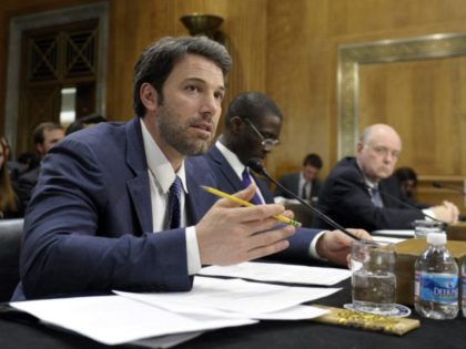 Actor and Eastern Congo Initiative Founder Ben Affleck, left, testifies on Capitol Hill in Washington, Wednesday, Feb. 26, 2014, before the Senate Foreign Relations Committee hearing on the Congo. Raymond Gilpin, Academic Dean of the Africa Center for Strategic Studies at the National Defense University, center, and former U.S. Ambassador …