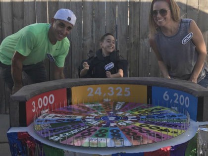Anthony Alfano, 8, of Melrose Park, Illinois, is turning heads after his parents fashioned a Wheel of Fortune Halloween costume out of his wheelchair.