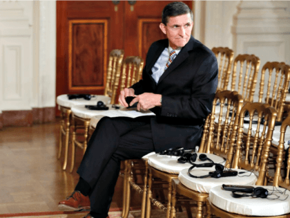 Gen. Mike Flynn sits alone Carolyn KasterAP