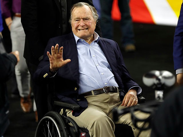 FILE - In this April 2, 2016, file photo, former President George H. W. Bush waves as he arrives at NRG Stadium before the NCAA Final Four tournament college basketball semifinal game between Villanova and Oklahoma in Houston. Houston-area media are quoting former President George H.W. Bush's chief of staff …