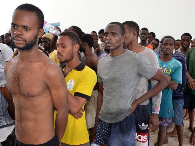 Migrants arrive at the El-Kitif port in the Tunisian town of Ben Guerdane, some 40 kilomet