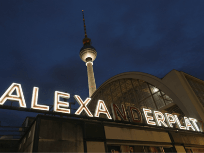 BERLIN, GERMANY - JULY 13: The broadcast tower at Alexanderplatz stands behind an illumina