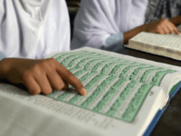 Indian Muslim girls read the Koran at the Madrasatur-Rashaad religious school in Hyderabad on June 19, 2017, during the holy month of Ramadan. Muslims are encouraged to pray and read the Koran during Islam's holiest month. / AFP PHOTO / NOAH SEELAM (Photo credit should read NOAH SEELAM/AFP/Getty Images)