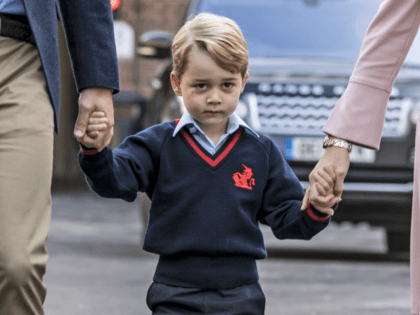 LONDON, ENGLAND - SEPTEMBER 7: (EDITORS NOTE: Retransmission of #843616140 with alternate crop.) Prince George of Cambridge arrives for his first day of school at Thomas's Battersea on September 7, 2017 in London, England. (Photo by Richard Pohle - WPA Pool/Getty Images)