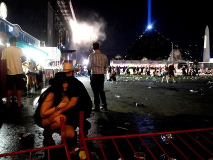 LAS VEGAS, NV - OCTOBER 01: People take cover at the Route 91 Harvest country music festi