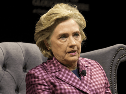 CHELTENHAM, ENGLAND - OCTOBER 15: Hillary Clinton is interviewed by Mariella Frostrup (not