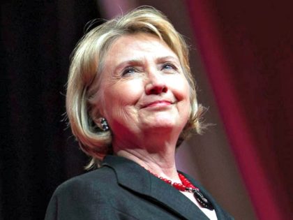 Hillary smiling Cliff OwenAP Photo