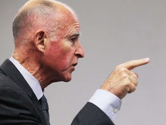 SAN FRANCISCO - OCTOBER 18: California attorney general and Democratic candidate for governor Jerry Brown gestures as he speaks during a news conference with Asian Pacific Islander leaders on October 18, 2010 in San Francisco, California. With just over two weeks to go until election day, Jerry Brown received endorsements …