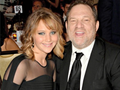 Actress Jennifer Lawrence (L) and producer Harvey Weinstein attend the 24th Annual GLAAD M
