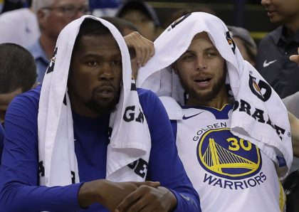 Kevin Durant and Stephen Curry (Ben Margot / Associated Press)