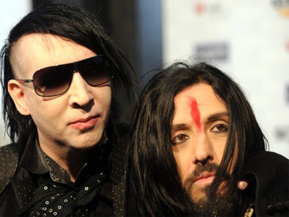 Musicians Marilyn Manson (L) and Twiggy Ramirez arrive at the 5th annual �Scream Awards� at the Greek Theatre in Los Angeles, California on October 16, 2010. AFP PHOTO / GABRIEL BOUYS (Photo credit should read GABRIEL BOUYS/AFP/Getty Images)