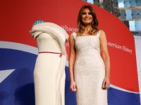 First lady Melania Trump donates her inaugural gown, designed by Herve Pierre, to the First Ladies' Collection at the Smithsonian's National Museum of American History, during a ceremony in Washington, Friday, Oct. 20, 2017. (AP Photo/Pablo Martinez Monsivais