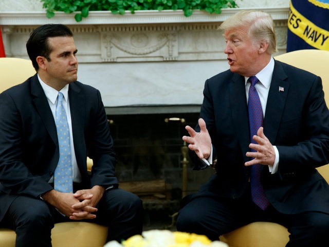 President Donald Trump meets with Governor Ricardo Rossello of Puerto Rico in the Oval Off