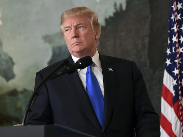 President Donald Trump arrives to speak about Iran from the Diplomatic Reception Room at the White House in Washington, Friday, Oct. 13, 2017. Trump says Iran is not living up to the "spirit" of the nuclear deal that it signed in 2015, and announced a new strategy in the speech. …