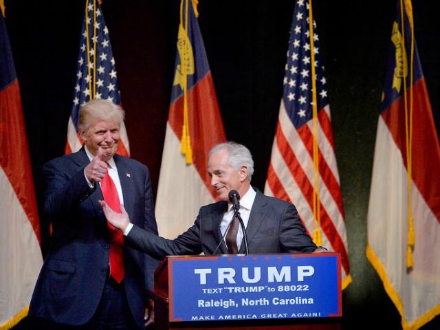 resumptive Republican presidential nominee Donald Trump stands next to Sen. Bob Corker (R-