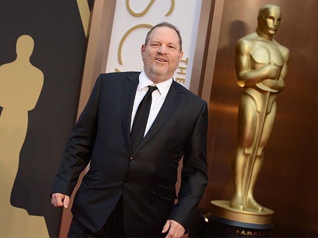 Harvey Weinstein arrives at the Oscars on Sunday, March 2, 2014, at the Dolby Theatre in L