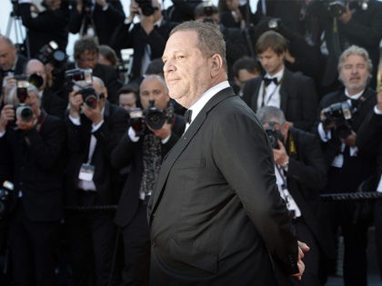 US producer Harvey Weinstein poses on May 24, 2013 as he arrives for the screening of the film 'The Immigrant' presented in Competition at the 66th edition of the Cannes Film Festival in Cannes. Cannes, one of the world's top film festivals, opened on May 15 and will climax on …