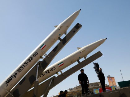 Zolfaghar missiles (R) are displayed during a rally marking al-Quds (Jerusalem) Day in Tehran on June 23, 2017. Chants against the Saudi royal family and the Islamic State group mingled with the traditional cries of 'Death to Israel' and 'Death to America' at Jerusalem Day rallies across Iran today. / …