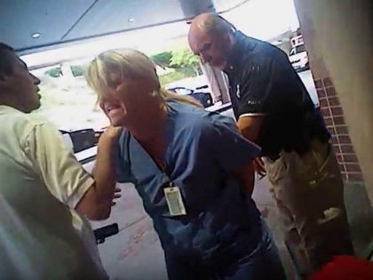 FILE - In this July 26, 2017, frame grab from video taken from a police body camera and provided by attorney Karra Porter, nurse Alex Wubbels is arrested by a Salt Lake City police officer at University Hospital in Salt Lake City. Authorities say a Utah police officer who was …