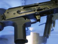 bump-stock-gun-associated-press-photo In this Oct. 4, 2017, photo, a device called a "bump stock" is attached to a semi-automatic rifle at the Gun Vault store and shooting range in South Jordan, Utah. The National Rifle Association announced its support Ton Oct. 5 for regulating the devices that can effectively convert semi-automatic rifles …