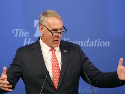 WASHINGTON, DC - SEPTEMBER 29: Interior Secretary Ryan Zinke addresses criticism of his travel practices before delivering a speech billed as 'A Vision for American Energy Dominance.' at the Heritage Foundation on September 29, 2017 in Washington, DC. Zinke and his aides have reportedly taken several flights on private or …