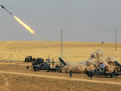 A picture taken on October 26, 2017 shows rockets being launched from Iraqi security force