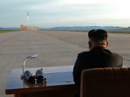 TOPSHOT - This undated picture released from North Korea's official Korean Central News Agency (KCNA) on September 16, 2017 shows North Korean leader Kim Jong-Un inspecting a launching drill of the medium-and-long range strategic ballistic rocket Hwasong-12 at an undisclosed location. Kim vowed to complete North Korea's nuclear force despite …