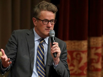 WASHINGTON, DC - JULY 12: MSNBC 'Morning Joe' host Joe Scarborough speaks during an interview with his co-host Mika Brzezinski and philanthropist and financier David Rubenstein during a Harvard Kennedy School Institute of Politics event in the McGowan Theater at the National Archives July 12, 2017 in Washington, DC. Scarborough …