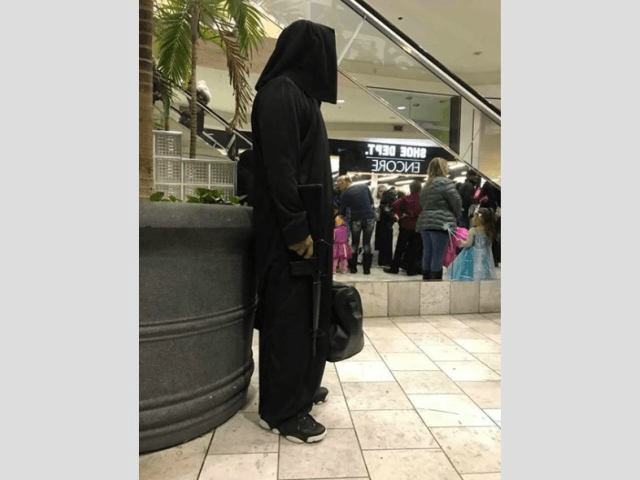A man wearing what some believed was an ISIS-inspired Halloween costume, complete with a toy rifle, sparked panic in a Nebraska mall on Friday — though he insists it was all a misunderstanding.